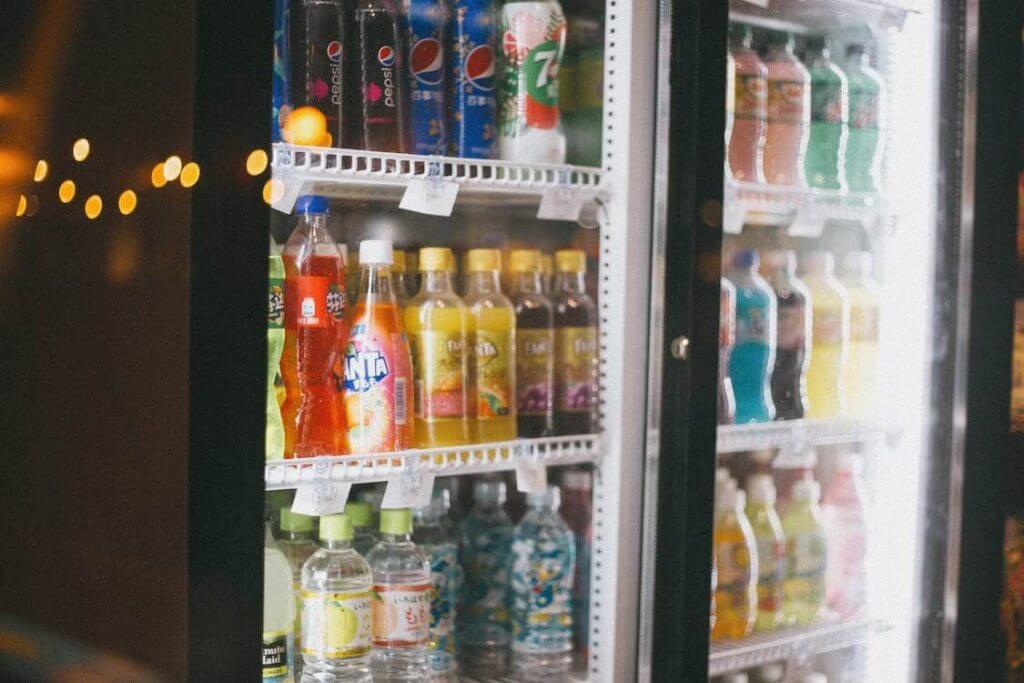 drinks for sale in merchandiser refrigerator