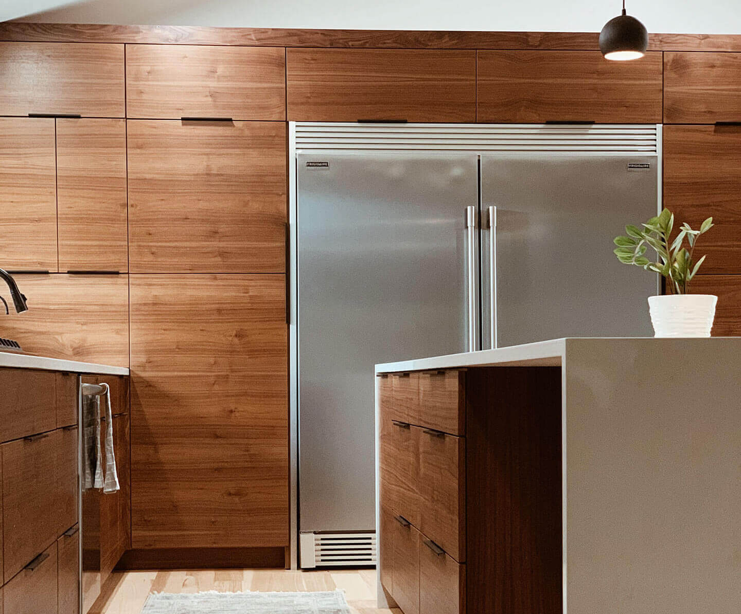 large stainless steel refrigerator in kitchen